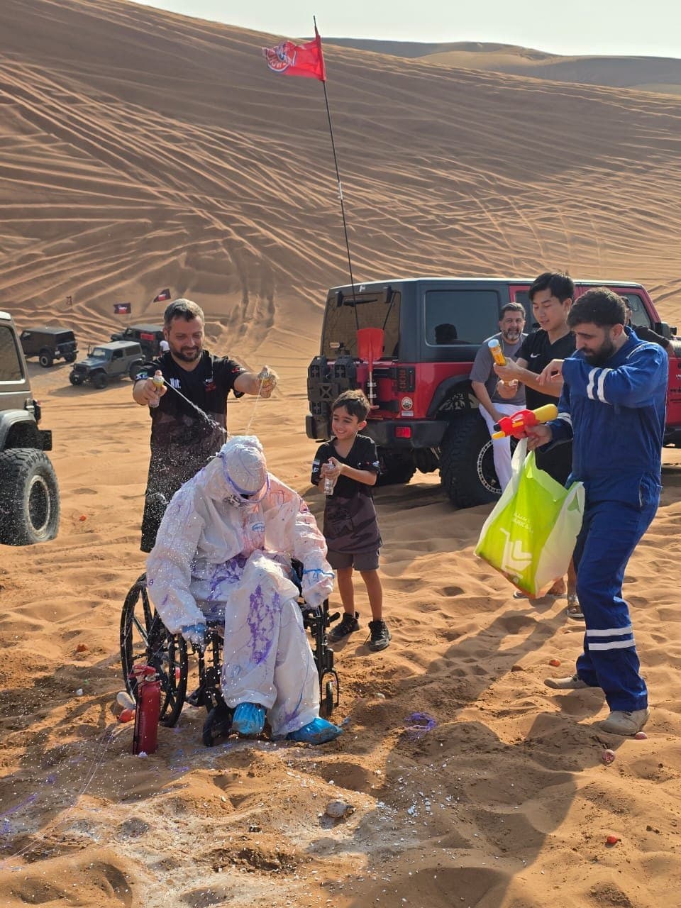 Members collecting litter during a desert cleanup